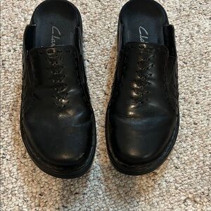 Clark’s ladies black slip ons.  Size 6.